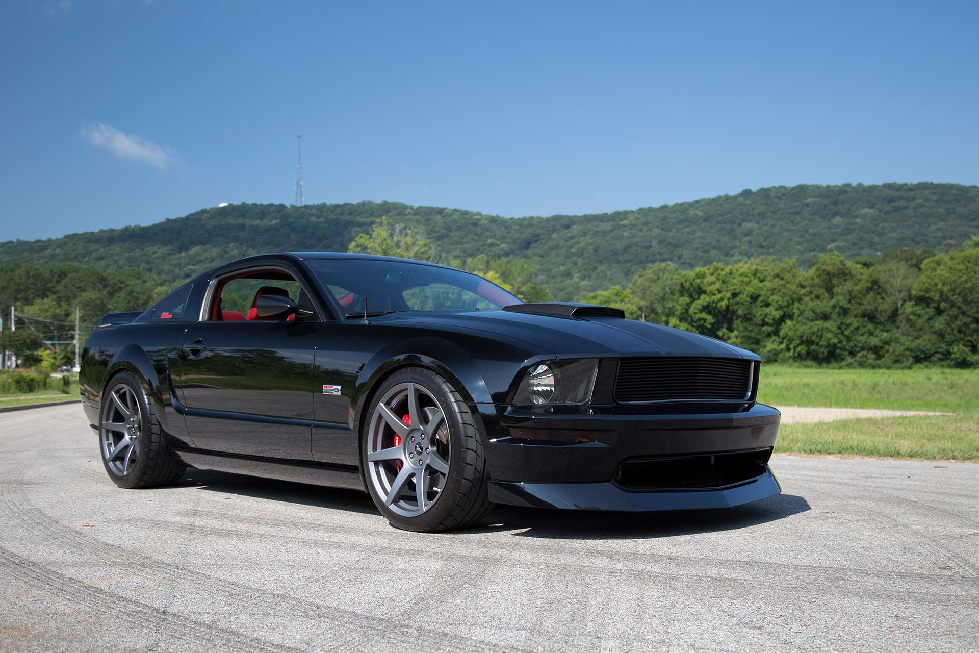 black sn197 ford mustang gt with project 6gr seven wheels