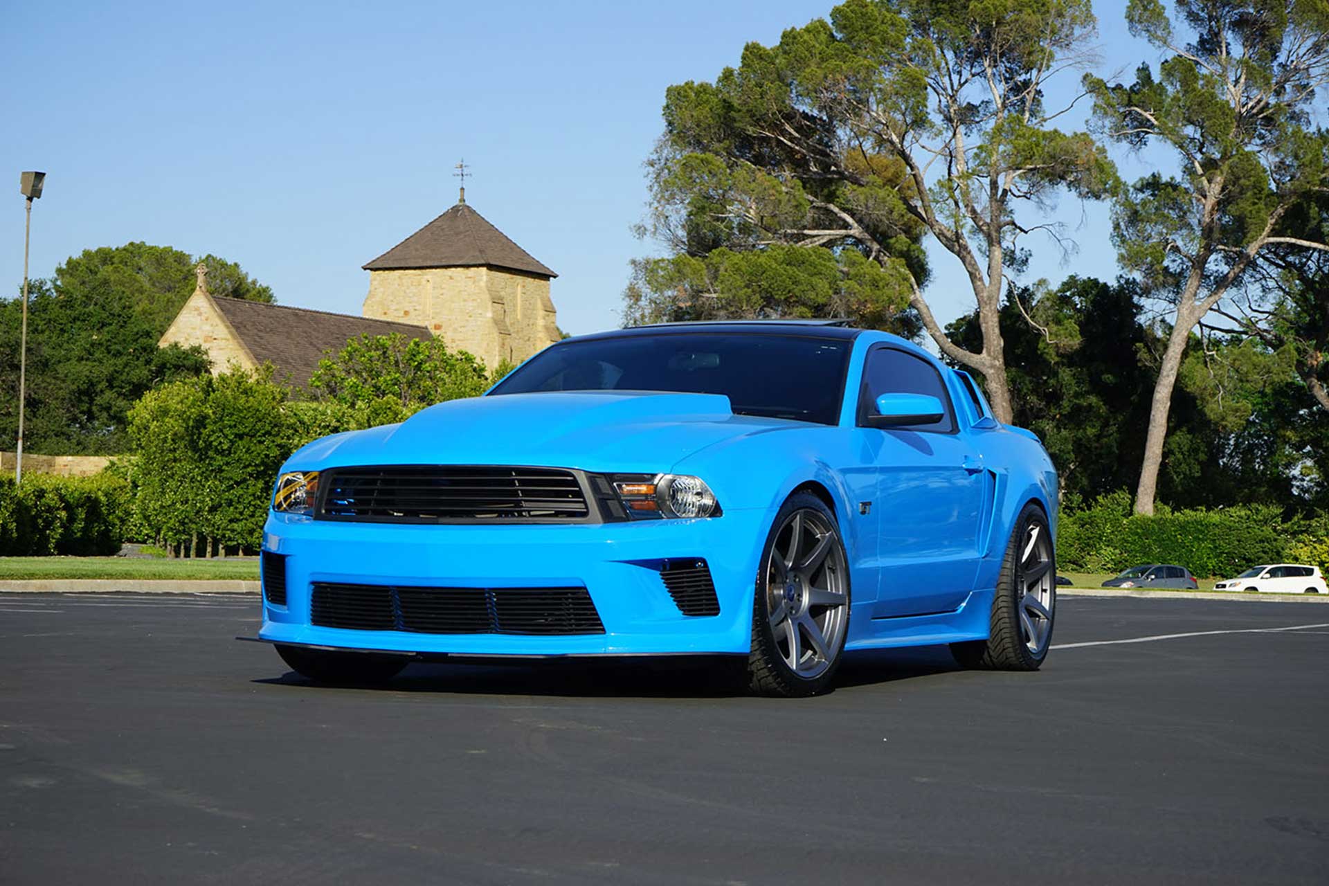 grabber blue s197 ford mustang gt with carbon fiber dipped project 6gr seven wheels