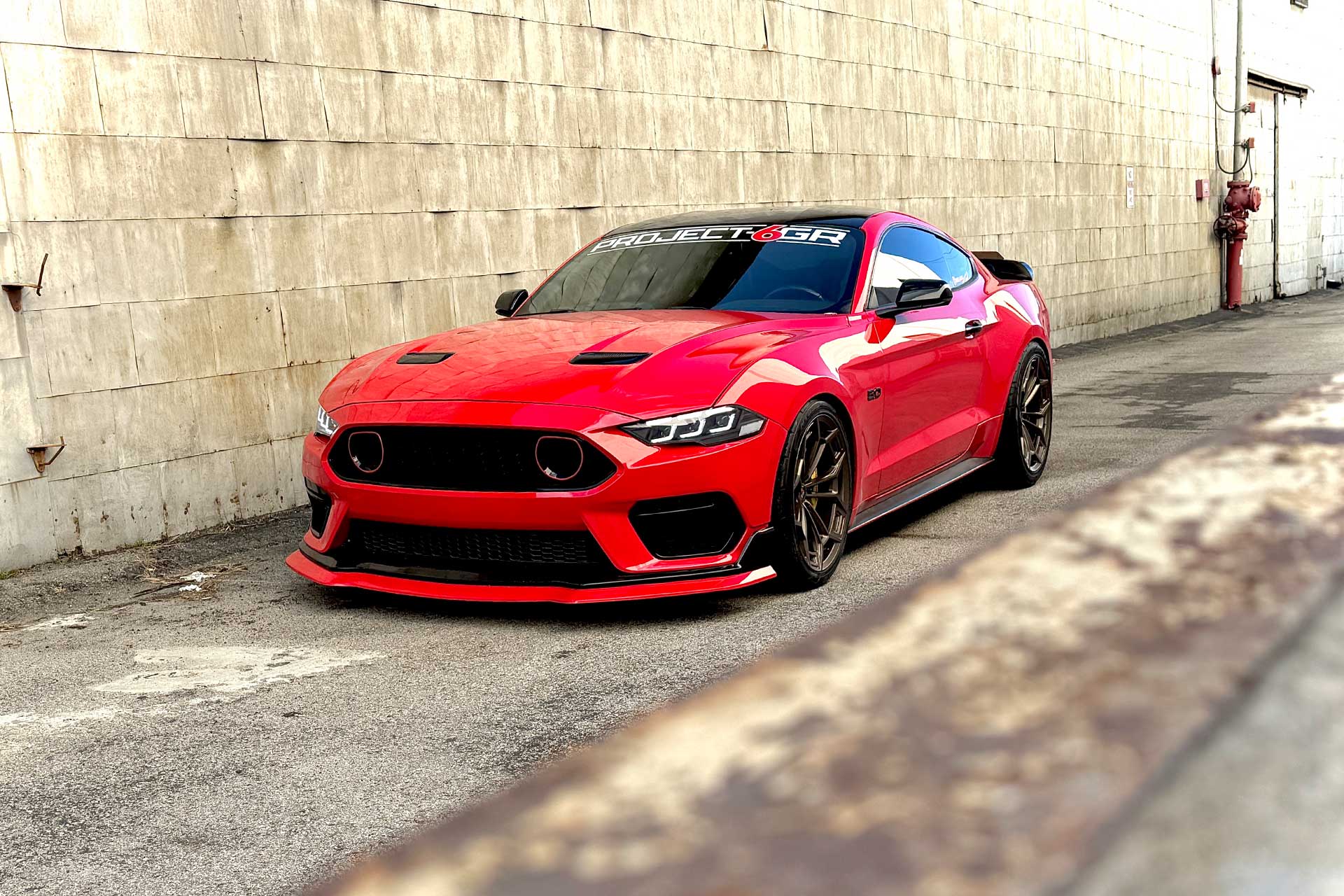 race red s550 ford mustang gt with project 6gr ten d wheels