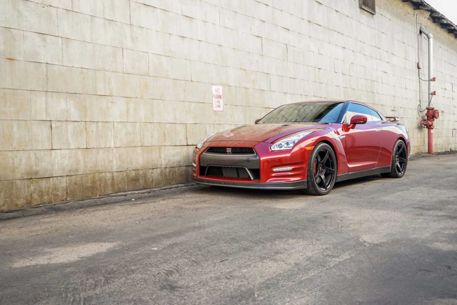 red r35 nissan gtr with gloss black project 6gr five wheels