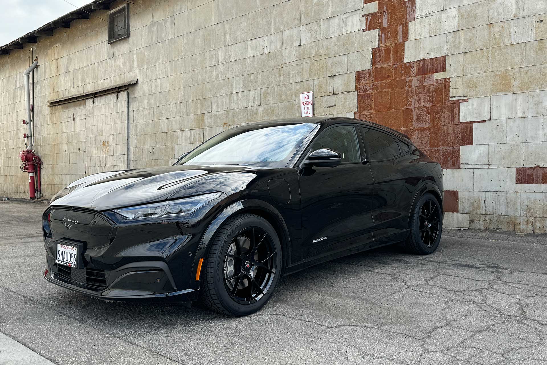 shadow black ford mustang mach e gt with project 6gr ten wheels